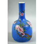 A CHINESE BLUE GROUND BOTTLE VASE, with floral decoration upon incised decoration, six character
