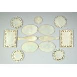 A GOOD COLLECTION OF CHINESE MOTHER OF PEARL GAMING COUNTERS, various shapes, (13).