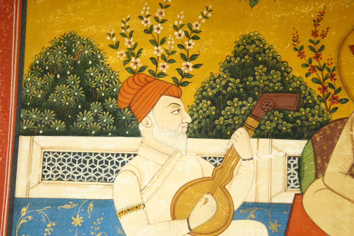 A LARGE INDIAN MINIATURE PAINTING ON PAPER, depicting a seated holy man with a musician and - Image 4 of 6