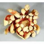 A LARGE CARVED IVORY FLOWER, 14cm wide.