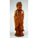 A FINE CHINESE BOXWOOD CARVING OF GUANYIN, 18cm high.