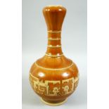 A CHINESE LIGHT BROWN GROUND PORCELAIN VASE, with a band of unusual decoration to the body, 25cm