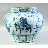 A LARGE CHINESE BLUE AND WHITE GLAZED POTTERY BULBOUS VASE, painted with figures on horseback,