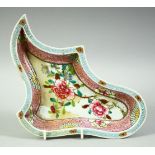 A CHINESE FAMILLE ROSE PORCELAIN UNUSUAL SHAPED DISH, painted with flowers and with gilt highlights,