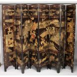 A LARGE CHINESE EIGHT PANEL LACQUER SCREEN, carved and painted with traces of gilt, depicting