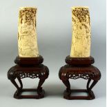 A PAIR OF JAPANESE MEIJI PERIOD CARVED IVORY TUSK VASES, circa 1890, the tusks mounted to hardwood