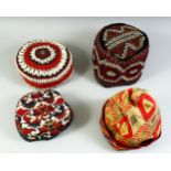 FOUR VARIOUS UZBEK AND TURKAMAN EMBROIDERED HATS.