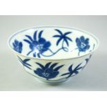 A CHINESE BLUE AND WHITE PORCELAIN BOWL, painted with large flower heads, with six character mark to