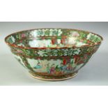 A CHINESE CANTON FAMILLE ROSE PORCELAIN BOWL, painted with panels of figures, birds and native
