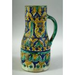 A FINE LARGE 19TH CENTURY MOROCCAN GLAZED POTTERY JUG, 26cm high.
