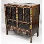 A CHINESE MOTHER OF PEARL INLAID HARDWOOD CABINET, with two large doors opening to reveal a