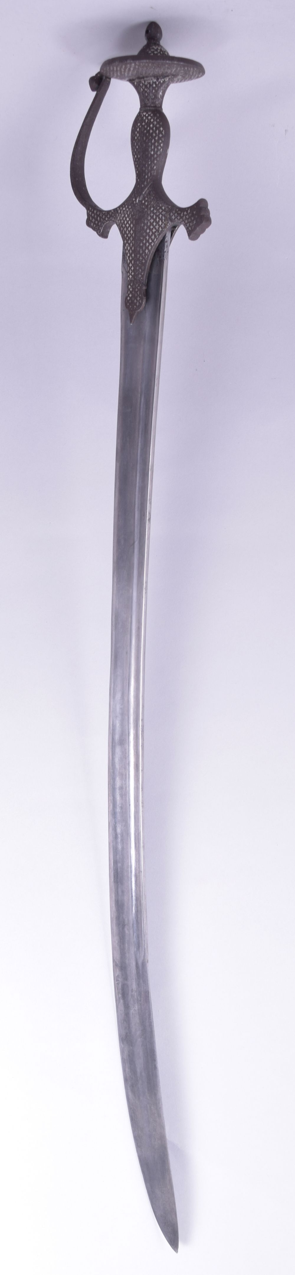 A FINE 18TH CENTURY INDIAN WATERED STEEL TULWAR SWORD, with silver inlaid handle, 88.5cm long.