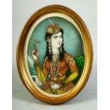 AN INDIAN MINIATURE OVAL PORTRAIT depicting the wife of Muhammad Shah, on ivory, encasced within a