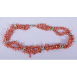 A NATURALISTIC CORAL NECKLACE, including seven small millefleur beads.