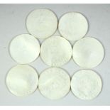 A COLLECTION OF CHINESE MOTHER OF PEARL CIRCULAR GAMING COUNTERS, (8).