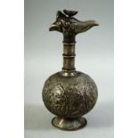 A CHINESE WHITE METAL GLOBULAR VESSEL, with bird shape finial, the body with engraved decoration,