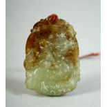 A CHINESE CARVED JADE PENDANT, 5cm.