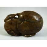 A CHINESE CARVED HARDSTONE FRUIT, 7cm long.