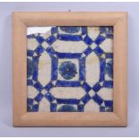 AN 18TH CENTURY POTTERY DAMASCUS TILE, framed, tile 22cm x 22cm.