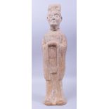 A LARGE TERRACOTTA MODEL OF A COURT OFFICIAL, possibly Han dynasty, 56.5cm high.