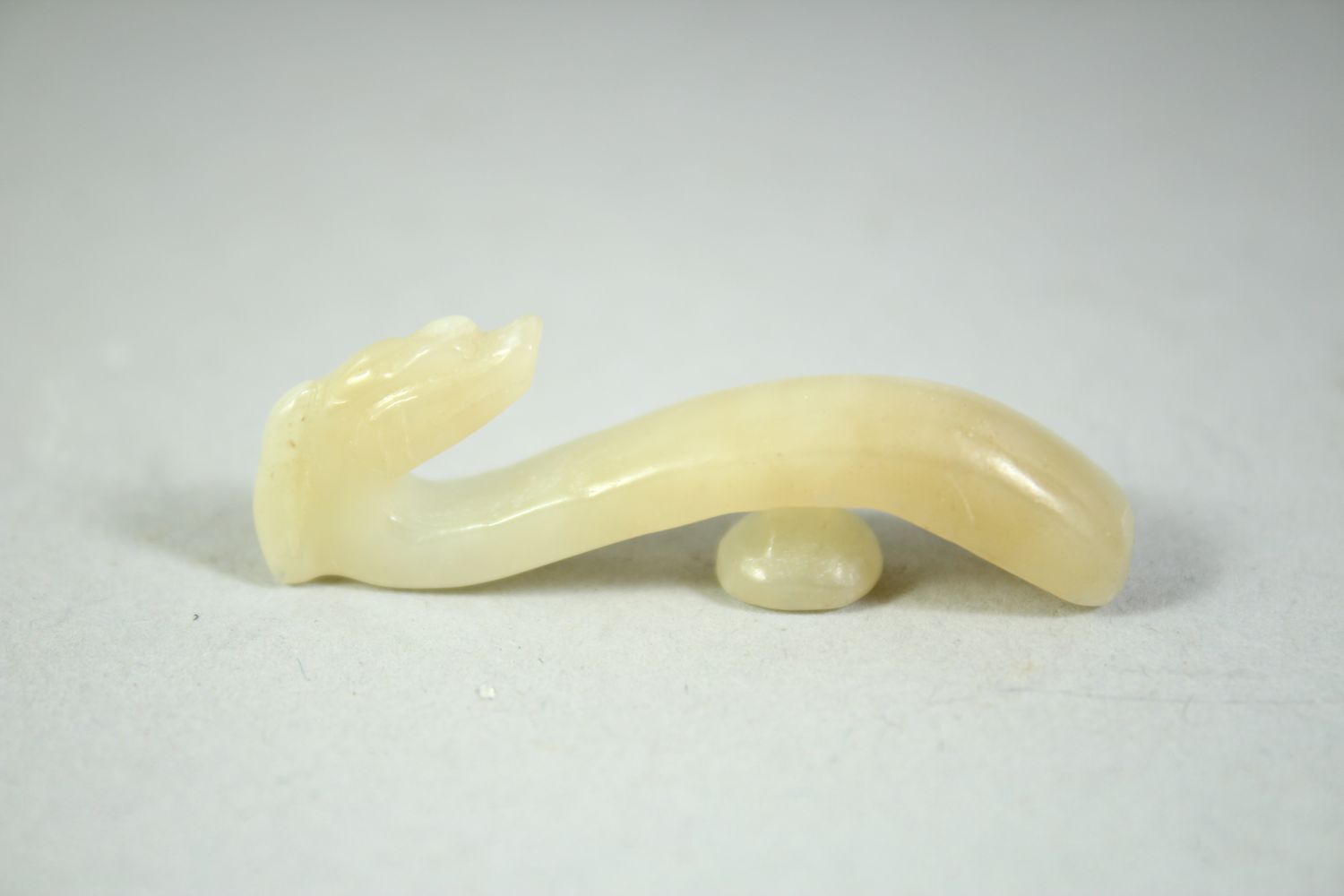 FOUR SMALL CHINESE CARVED JADE HOOKS, (4). - Image 4 of 5