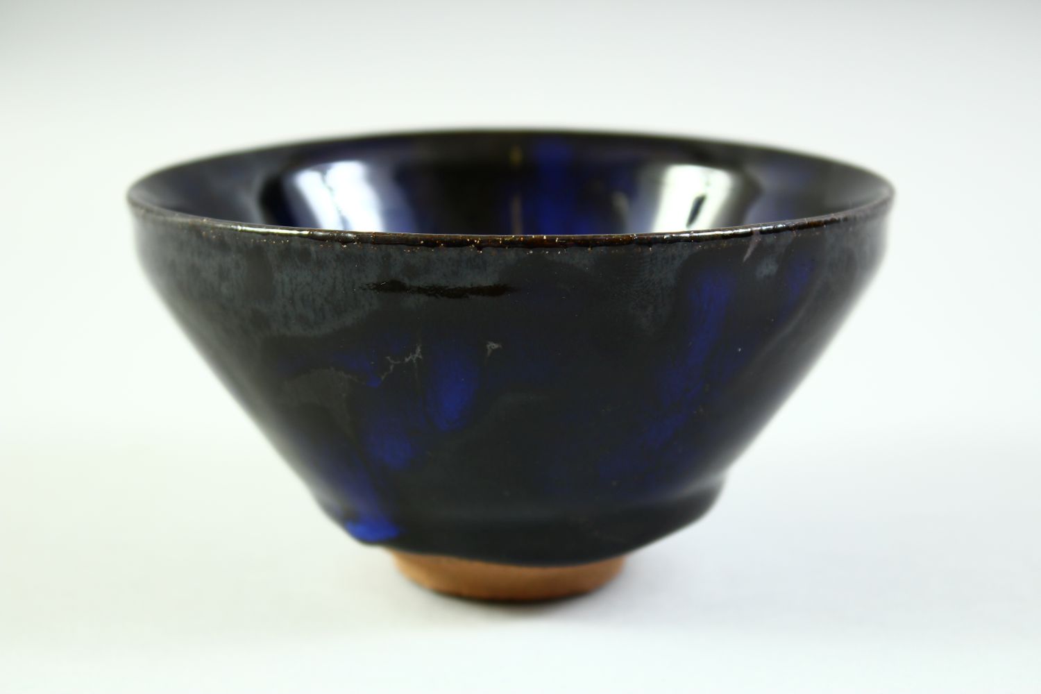 A CHINESE DARK BLUE GLAZE POTTERY BOWL, with carved mark to base, 12cm diameter. - Image 3 of 8