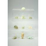 TEN SMALL CHINESE JADE CARVINGS, including figures and animals, (10).
