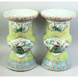 A LARGE PAIR OF CHINESE FAMILLE JAUNE PORCELAIN VASES, painted with panels of exotic birds and