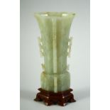 A 17TH CENTURY CHINESE CARVED JADE FACETED GU VASE Kangxi, the upper section of hexagonal form and