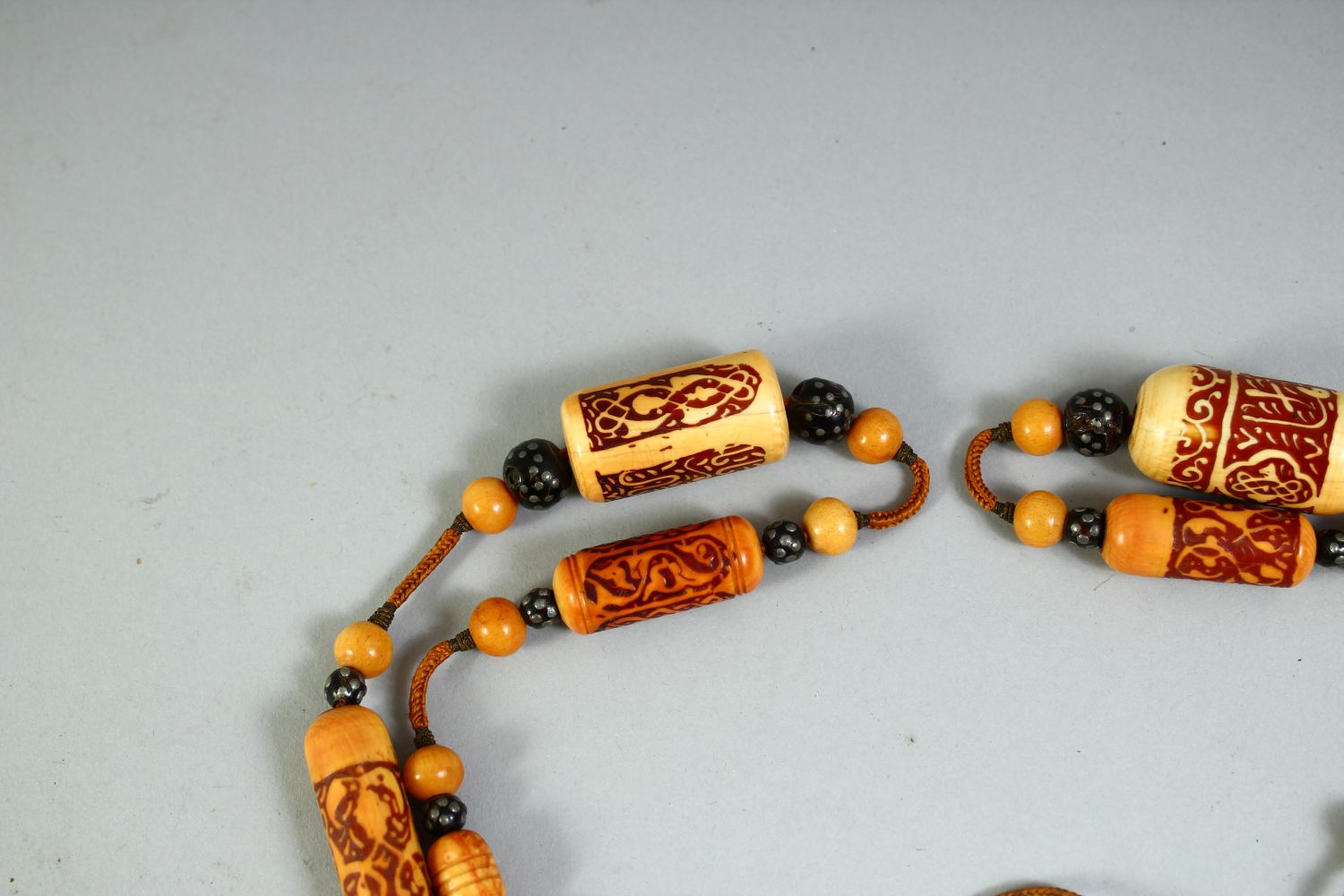 A RARE 18TH CENTURY OR EARLIER OTTOMAN IVORY, WALRUS AND BLACK CORAL BEADED NECKLACE. - Image 3 of 6