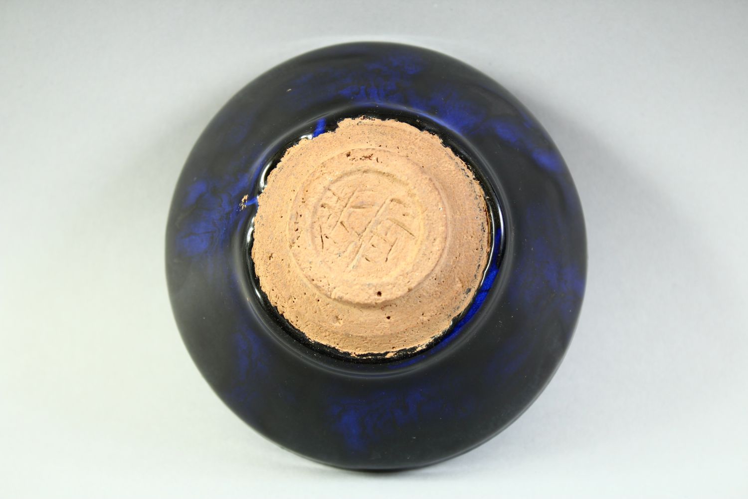 A CHINESE DARK BLUE GLAZE POTTERY BOWL, with carved mark to base, 12cm diameter. - Image 7 of 8