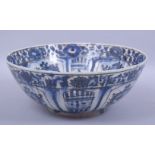 A LARGE 17TH/18TH CENTURY PERSIAN SAFAVID BLUE AND WHITE POTTERY BOWL, signed, 28cm diameter.