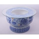 A LARGE JAPANESE ARITA BLUE AND WHITE PORCELAIN HIBACHI, possibly Taisho period, decorated with