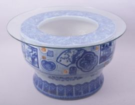 A LARGE JAPANESE ARITA BLUE AND WHITE PORCELAIN HIBACHI, possibly Taisho period, decorated with