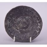 A RARE EARLY ISLAMIC OR POSSIBLY ROMAN BRONZE BOWL, the centre depicting a bird of prey surrounded