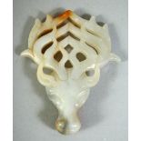 A CARVED JADE / HARDSTONE DEER HEAD, 8.5cm.