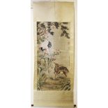 A GOOD LARGE CHINESE SCROLL PAINTING, depicting a crane on a mound with a deer surrounded with