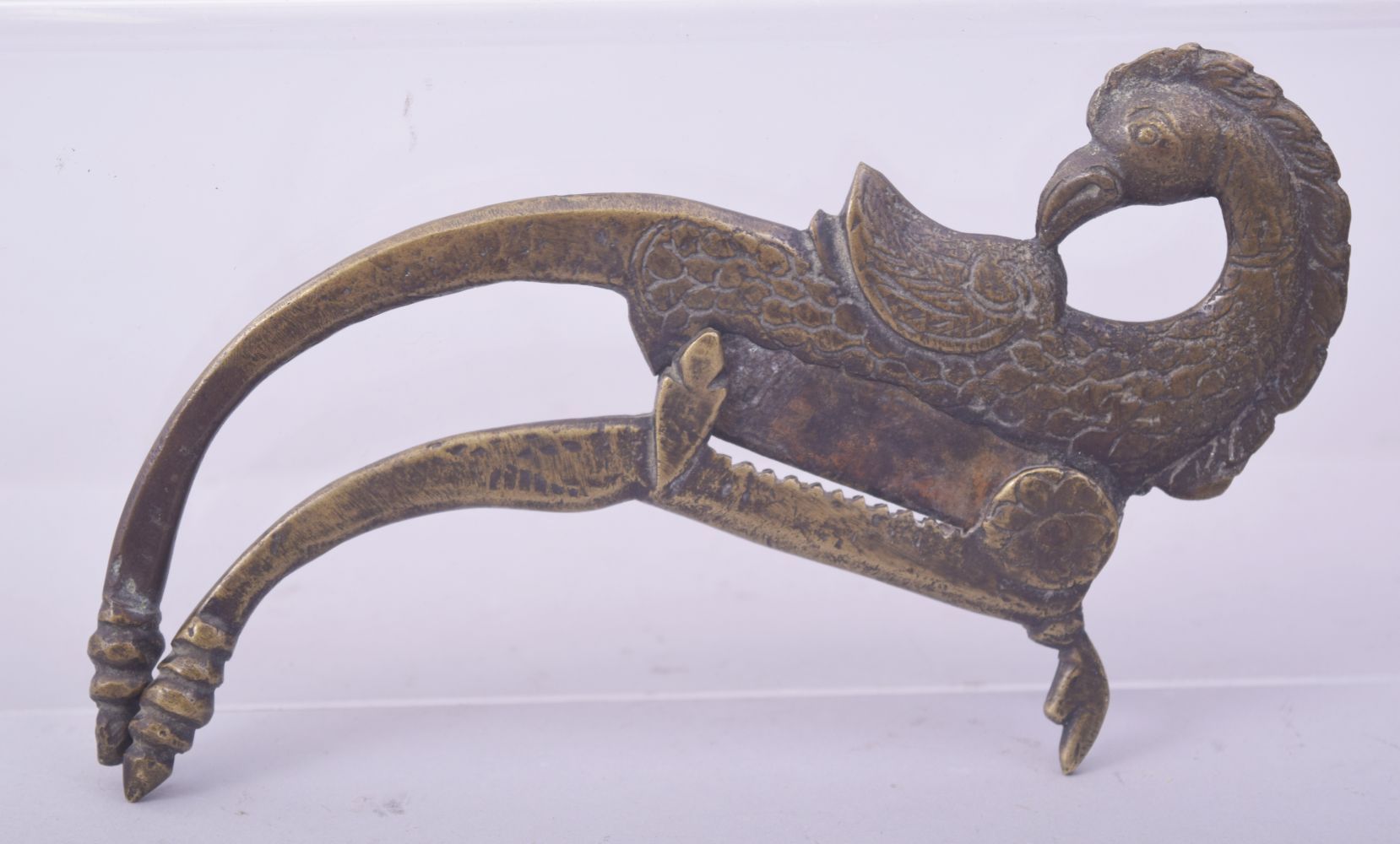 AN INDIAN BETEL NUT CUTTER, 17.5cm long.