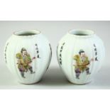 A SMALL PAIR OF CHINESE PORCELAIN JARS, painted with various figures and calligraphy, each base with