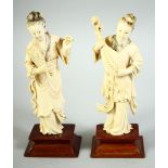 TWO CHINESE CARVED IVORY MUSICIANS, mounted to wooden bases, each approx. 14.5cm high.