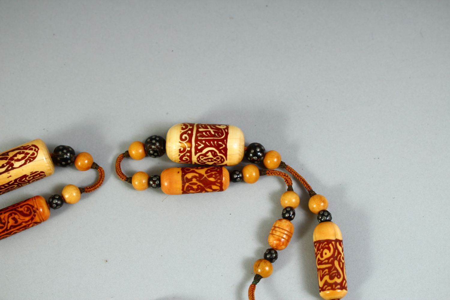 A RARE 18TH CENTURY OR EARLIER OTTOMAN IVORY, WALRUS AND BLACK CORAL BEADED NECKLACE. - Image 2 of 6