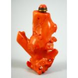 A CHINESE RED CORAL SNUFF BOTTLE & STOPPER, 2.9in high overall.