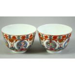 A PAIR OF CHINESE FAMILLE ROSE 'BARAGON TUMED' PORCELAIN CUPS, each cup enamelled with buddhistic