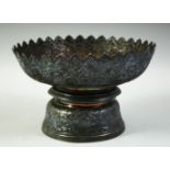 A LARGE 19TH CENTURY THAI SILVER LOTUS SHAPED OFFERING FOOTED TRAY, with Chinese hallmarks to