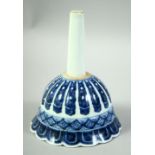 A CHINESE BLUE AND WHITE PORCELAIN PETAL FORMED FUNNEL, with six character mark, 16cm long.