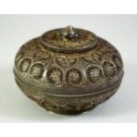 A FINE 19TH CENTURY INDIAN SILVER FILIGREE LIDDED CIRCULAR BOX, 12cm diameter.