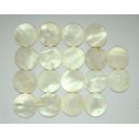 A COLLECTION OF CHINESE MOTHER OF PEARL CIRCULAR GAMING COUNTERS, (18).