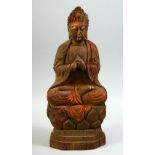 AN 18TH/19TH CENTURY CHINESE CARVED WOOD BUDDHA RELIQUARY, 33cm high.