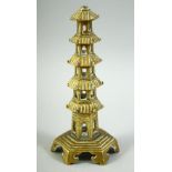 A BRASS MODEL OF A PAGODA, 19.5cm high.