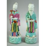 A PAIR OF 18TH CENTURY CHINESE PORCELAIN IMMORTAL FIGURES, both approx. 23cm high.